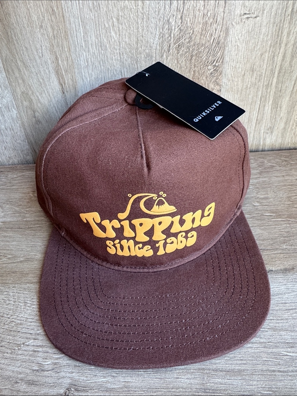 Quiksilver Brown Cap with Yellow 'Tripping Since 1969' Graphic
